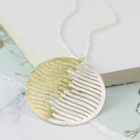 Silver and Gold Plated Wave Disc Necklace by Peace of Mind